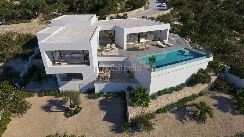 Foto 18c74be5-7030-47a8-b443-2eb7413f7ad3. Chalet avec piscine dans Cumbre del Sol Poble Nou de Benitatxell (el)