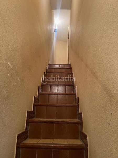 Foto ea473c0d-e9fc-45f8-b96c-ba61e72822a9. Casa adossada amb xemeneia a Els Molins Mataró