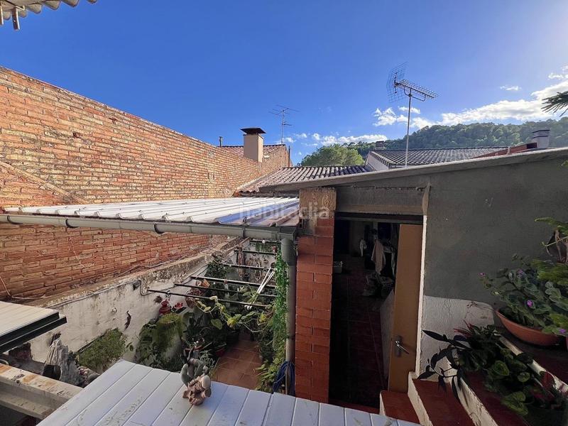 Foto 5dee0028-9809-4ba0-a001-e92c3b15262b. Casa a schiera con riscaldamento parcheggio in Castellbell i el Vilar