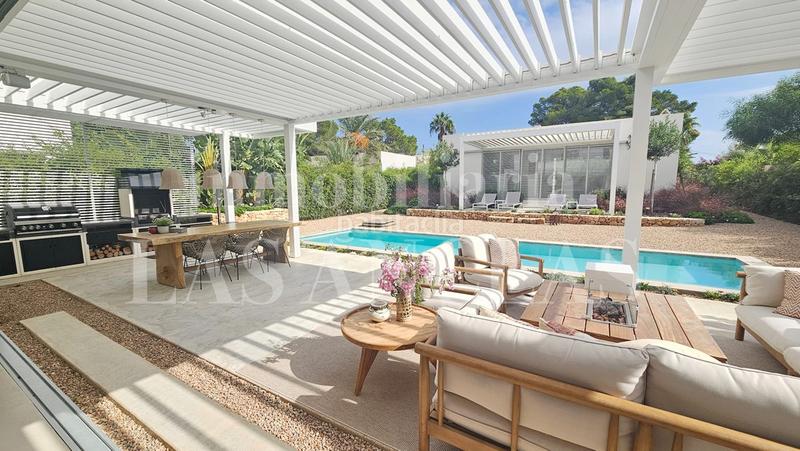 Foto ba8fd4d7-7264-486b-8be1-46868722b7fe. Haus mit heizung parking pool in Sant Carles Santa Eulària