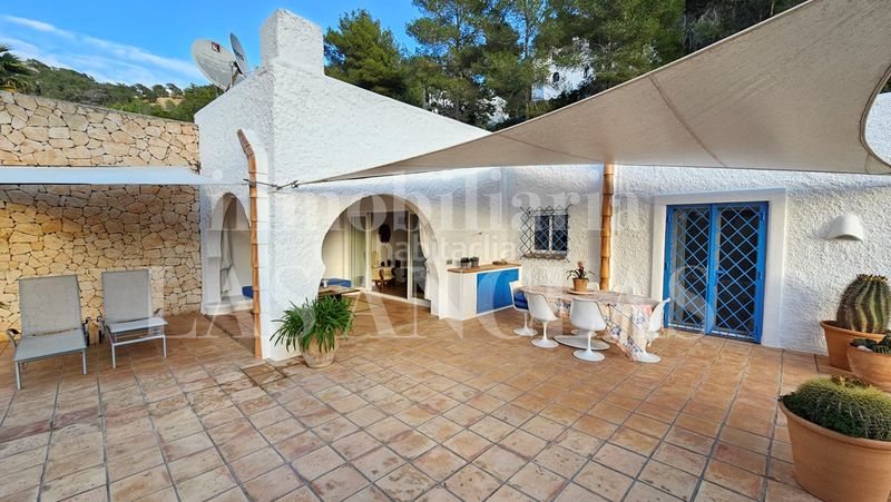 Foto 9f816213-db2a-4b7b-854f-4a8ed5ef69b2. Casa pareada hermosa casa pareada de una planta con jardín cerca de la playa en Santa Eulària