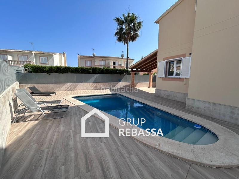 Foto 5788f7f6-8493-4b46-9a4c-28d6bfada2fb. Casa pareada pareado con jardín, piscina y garaje en ses cases noves en Marratxí