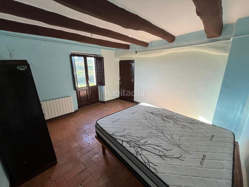 Foto cb6b493d-96a5-44b6-8611-a37cfdb3c7a3. Masia amb xemeneia calefacció aparcament a Sant Mateu de Bages