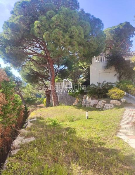 Foto b72438b0-ec4f-40cb-82a3-54c287293b7e. Reihenhaus in Canyelles Lloret de Mar