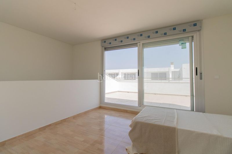 Foto 16bf18cb-72ca-42f6-aca5-36eed3488f56. Casa adossada amb aparcament piscina a Playa-Ben Afeli Almazora / Almassora