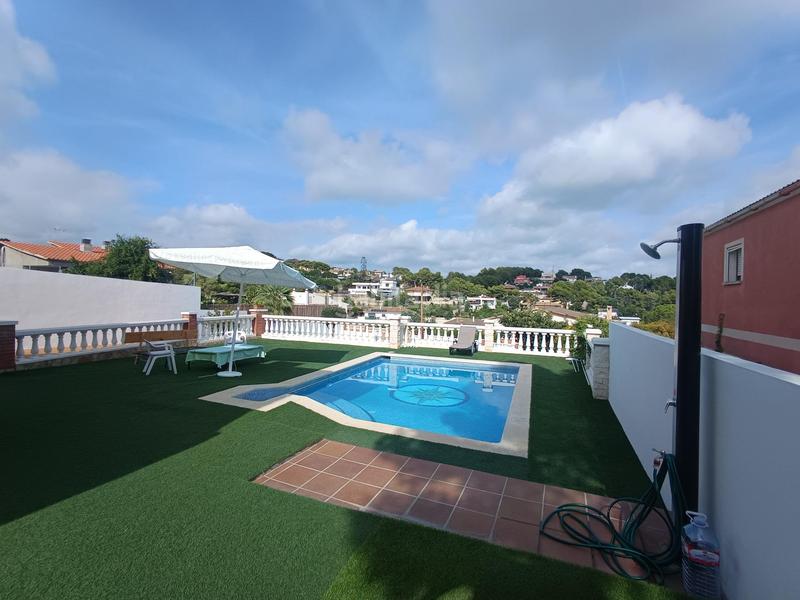 Foto ced387ac-fa90-482b-8d71-0d302e0bbdb4. Maison avec chauffage parking piscine dans costa Cunit - els jardins - els rosers Cunit