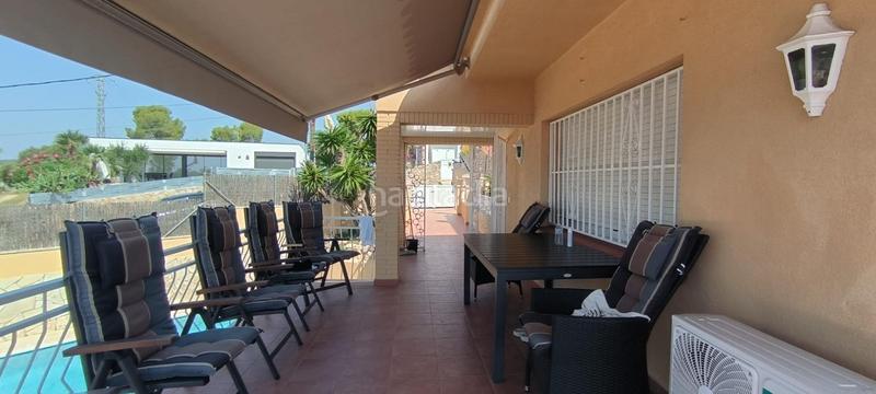 Foto b323bcc7-30c0-466a-865f-75398bda349e. Chalet mit heizung parking pool in Bellamar Calafell