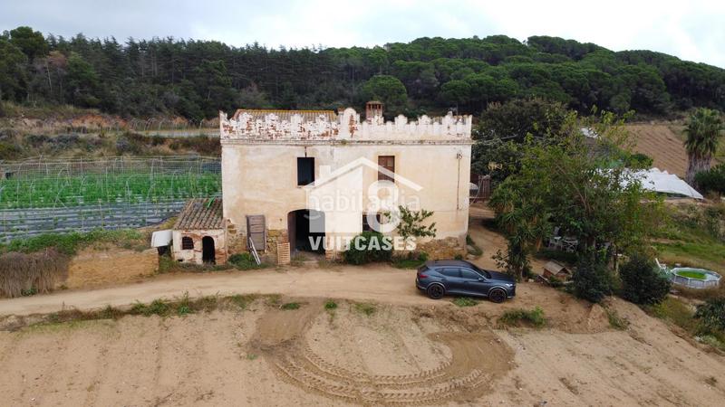 Foto c3bdb296-8842-4843-b85a-931e52cf71de. Bauernhof mit parking in Canet de Mar