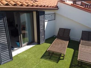 Àtic a Calella. Ático dúplex con terraza comunitaria