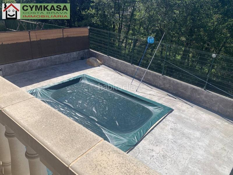 Foto eef706f5-434a-4f84-a7cd-f35a562392ca. Casa amb calefacció aparcament piscina a Aiguaviva Parc Vidreres