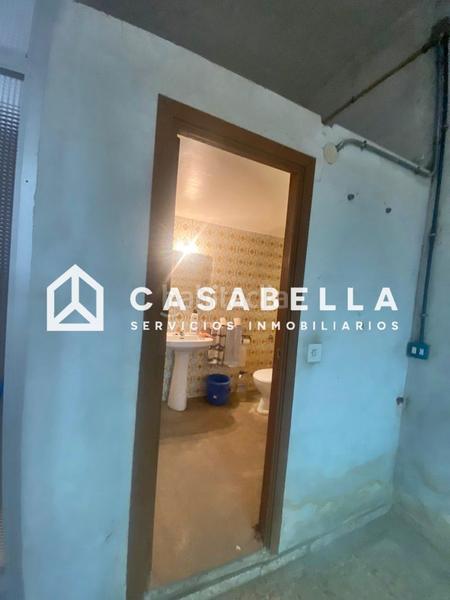 Foto 2c452984-bfb3-46cf-a306-87cb347e3ba2. Local comercial a Nou Moles Valencia