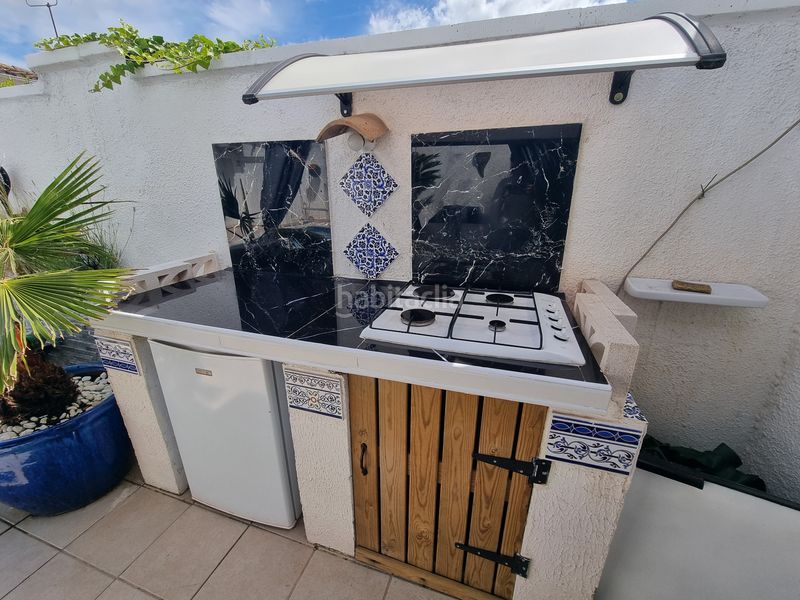 Foto f6451622-8179-47a1-9379-cc8358316dfc. Casa adossada amb xemeneia aparcament piscina a Puigmal - Mas Nou Empuriabrava