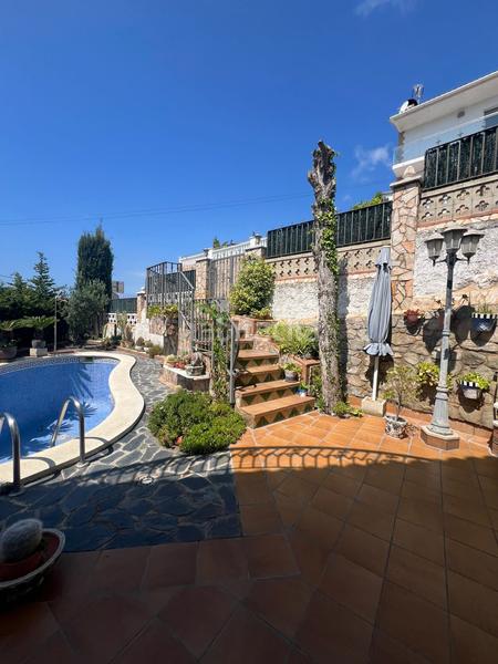 Foto 8647029e-0a93-4b9b-b441-318c824b7b1a. Chalet con camino parcheggio piscina in Pinemar Pineda de Mar