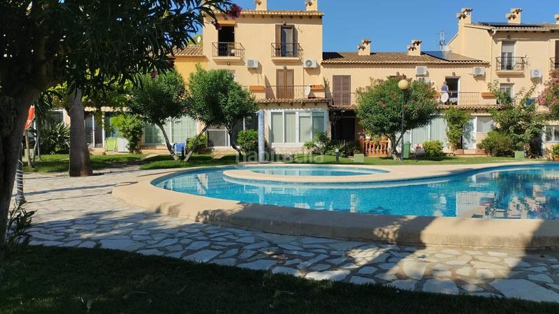 Foto 08fce906-578e-45cf-b5d6-8bb4d3e1763f. Casa a schiera con parcheggio piscina in El Montgó Dénia