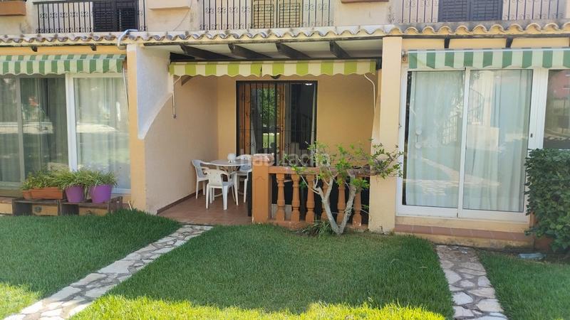Foto 096558f2-f6ef-46a5-b97c-065b38d1d1d2. Casa a schiera con parcheggio piscina in El Montgó Dénia