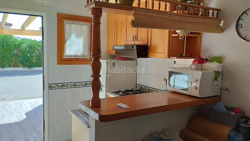 Foto dd6e9f90-a5f1-46b1-8cb4-0e843fbe0196. Casa a schiera con parcheggio piscina in El Montgó Dénia