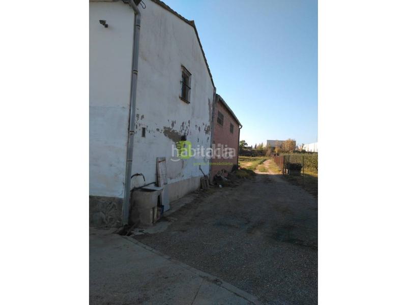Foto 6731e276-f7a1-40a5-a661-82408f62e230. Masia amb aparcament a Alcarràs