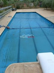 Haus in Pla de Santa Maria (El). Encantadora finca rústica con casa de madera y piscina – en part