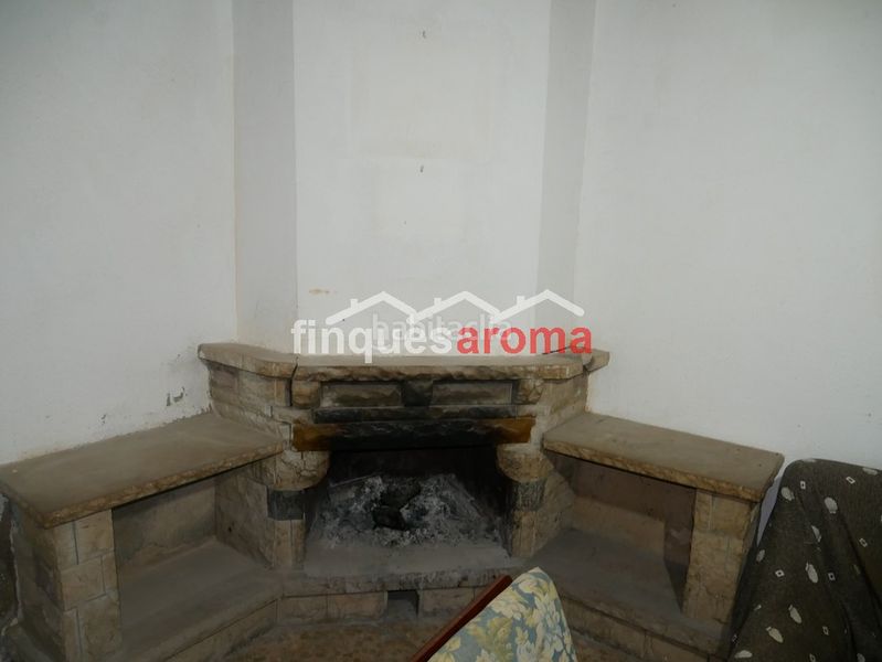 Foto 15f8d653-c102-48af-953c-6d5ac99e2b08. Casa amb xemeneia a Valls