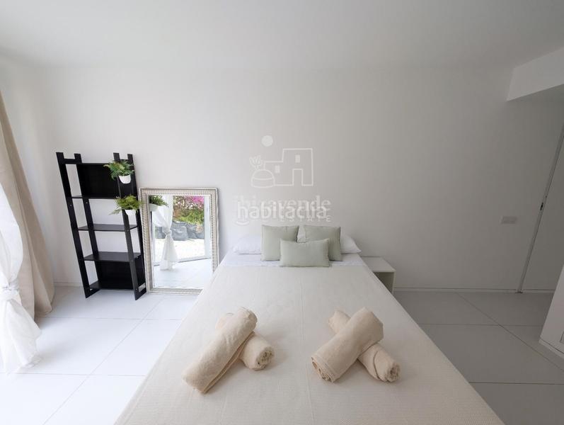 Foto 11a6870b-8e22-4c72-8303-09f0f394c9cd. Piso bajo moderno con jardín privado en marina botafoch en Ibiza