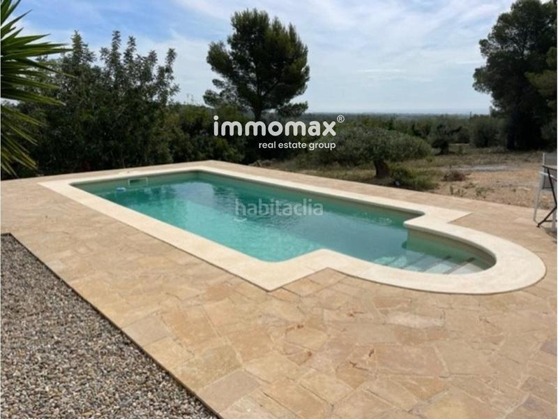 Foto c2ca467a-9d56-49ba-9c34-79b61e2074dd. Xalet amb piscina a Perelló (El)