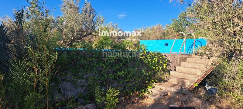 Foto ef2a8dd7-e89b-4249-bf30-0e75f7e6e2af. Terreny residencial a Roquetes