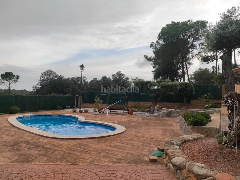 Foto 460a00d4-21ae-44c0-b4ca-d5355f42d91f. Chalet mit kamin parking pool in Santa Coloma de Farners