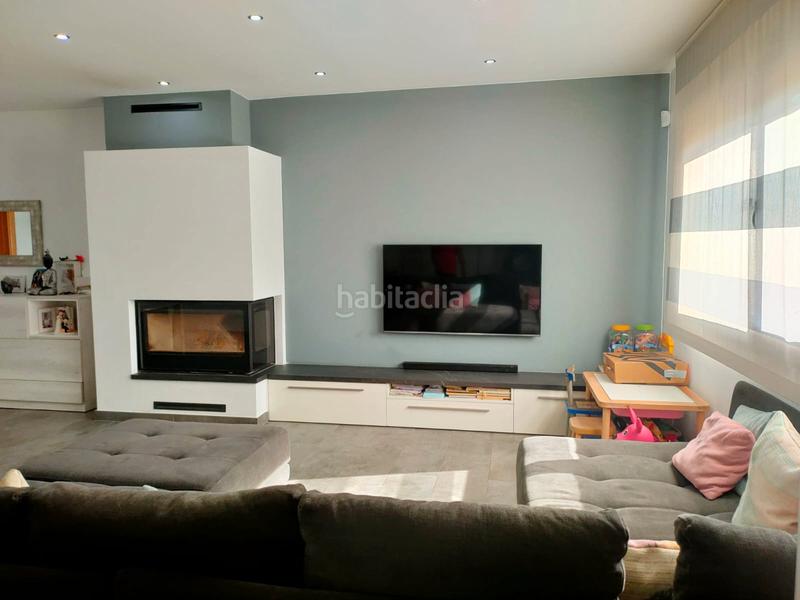 Foto af5eac44-5cb3-42b7-af18-05c4624737af. Maison jumelée avec cheminée chauffage parking dans Sils