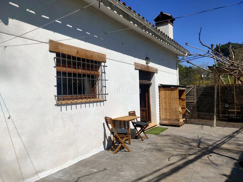 Foto 4f9a47a8-c40a-4f48-866f-d5375e3685ed. Casa amb xemeneia calefacció aparcament a Sils