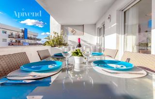 Pis  Port joan. Acogedor apartamento con piscina comunitaria y terraza en entorn