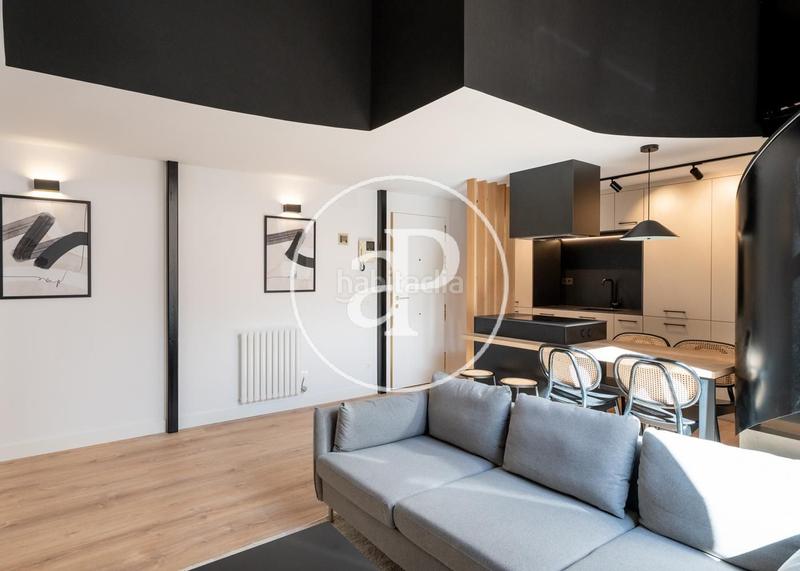 Foto d69e4010-ac44-43a1-984e-9045f5db418e. Duplex avec chauffage dans Cortes-Huertas Madrid