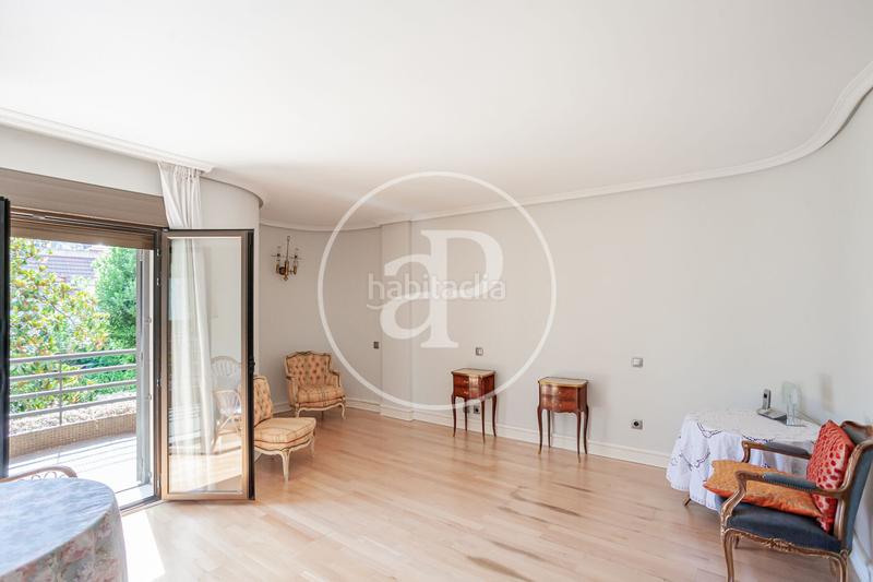 Foto eea54bd8-894f-4ba1-854b-508d7a94ad16. Casa aparellada amb calefacció aparcament a Nueva España Madrid