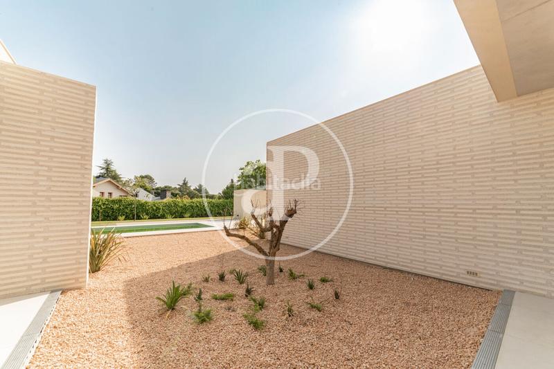 Foto 5128c455-1ff4-4b57-be38-ee7933f158d0. Casa con riscaldamento parcheggio piscina in Las Lomas Boadilla del Monte