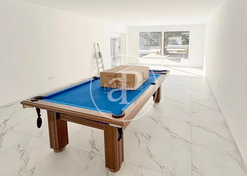 Foto 870d275e-ea09-4b7b-85ab-8ce19dcccf08. Casa con riscaldamento parcheggio piscina in urbanización La Moraleja La Moraleja