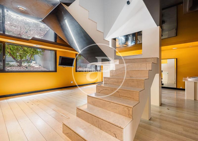 Foto 1e0b4374-a0e8-4f3d-9a21-6bf05da73e06. Casa con riscaldamento parcheggio piscina in urbanización La Moraleja La Moraleja