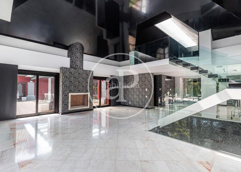 Foto 244c423c-c248-44d1-89a1-f4c599f5471a. Casa con riscaldamento parcheggio piscina in urbanización La Moraleja La Moraleja