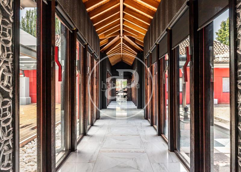 Foto b70a2112-9fe6-486c-997c-aae4dfb85112. Casa con riscaldamento parcheggio piscina in urbanización La Moraleja La Moraleja