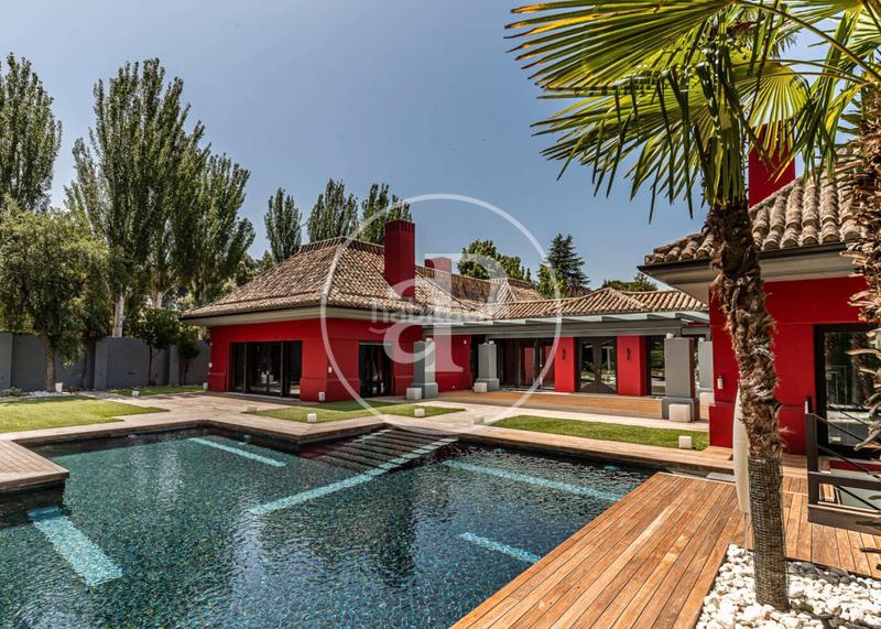 Foto d21e1065-584f-4548-b497-691d291dcb87. Casa con riscaldamento parcheggio piscina in urbanización La Moraleja La Moraleja