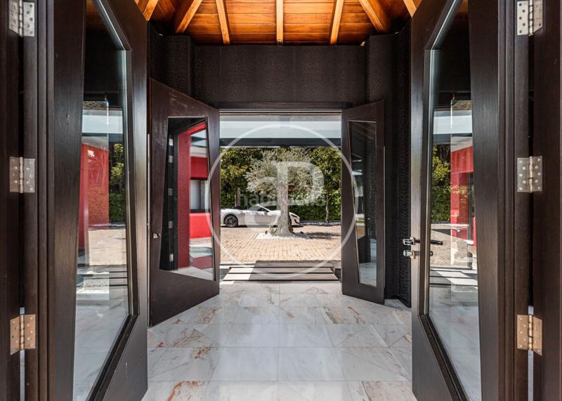 Foto d4ecb53f-6f39-4381-844d-7fc68df54ad8. Casa con riscaldamento parcheggio piscina in urbanización La Moraleja La Moraleja