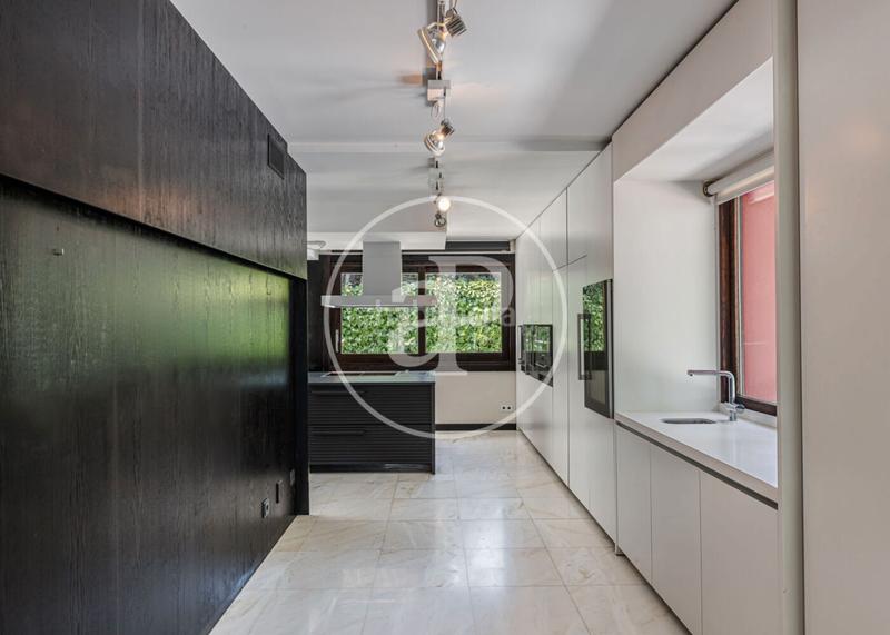 Foto f56e5e3b-dec2-462d-a9ab-d3e7a48448ae. Casa con riscaldamento parcheggio piscina in urbanización La Moraleja La Moraleja