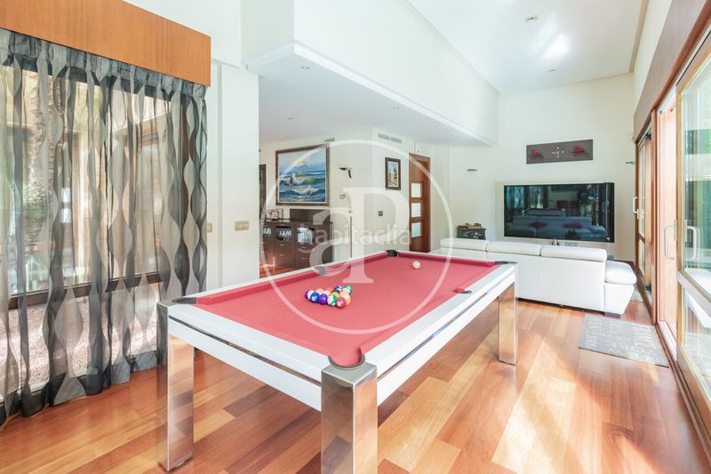 Foto 864ac588-089d-4d8a-a5b2-1b46d56b329e. Casa amb calefacció aparcament piscina a La Florida - El Plantío Madrid
