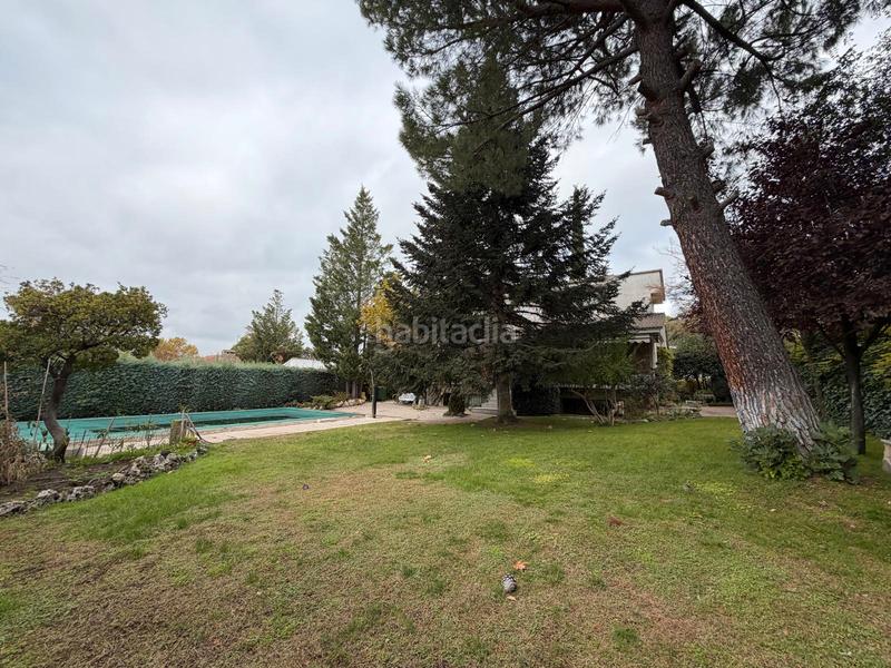 Foto 1f4de297-ca1e-48eb-a2e1-dadad8a33c59. Chalet con camino riscaldamento parcheggio piscina in Valdemorillo