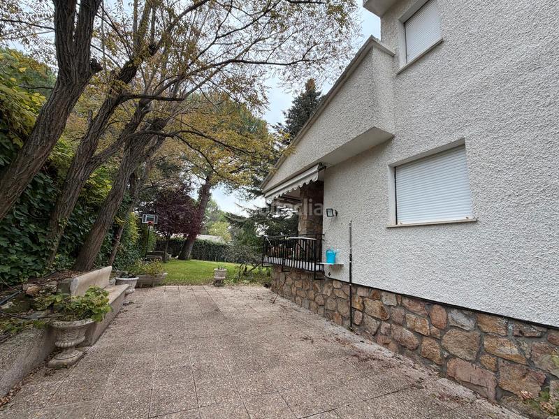 Foto f3dd4b30-e380-45e2-a752-6fb9a363e07e. Chalet con camino riscaldamento parcheggio piscina in Valdemorillo