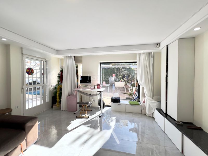 Foto c6af39b7-adcb-43b9-8e00-ab8d73398e24. Casa aparellada amb aparcament piscina a Casco Histórico Rivas - Vaciamadrid