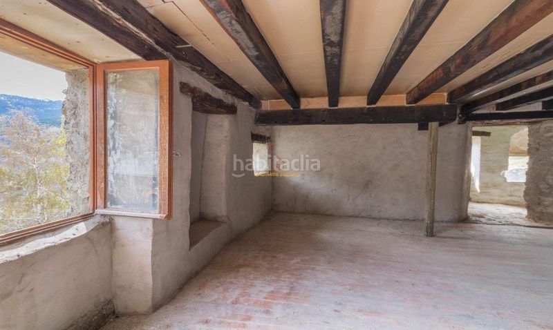 Foto 715ee819-d945-4247-9101-ea607a6bd509. Casa amb xemeneia aparcament a Osseja