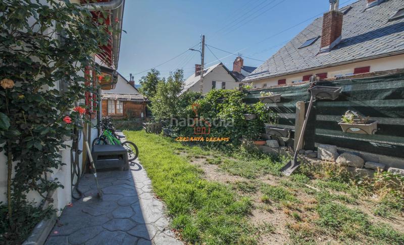 Foto 39a8a2ca-d36f-4e8a-a857-f2d68fd9f5cd. Casa pareada pareada con jardín en Enveitg