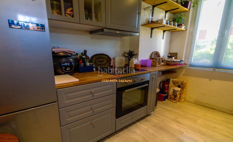 Foto acc69e09-09a9-4b89-9e2f-87568e12543b. Casa pareada pareada con jardín en Enveitg