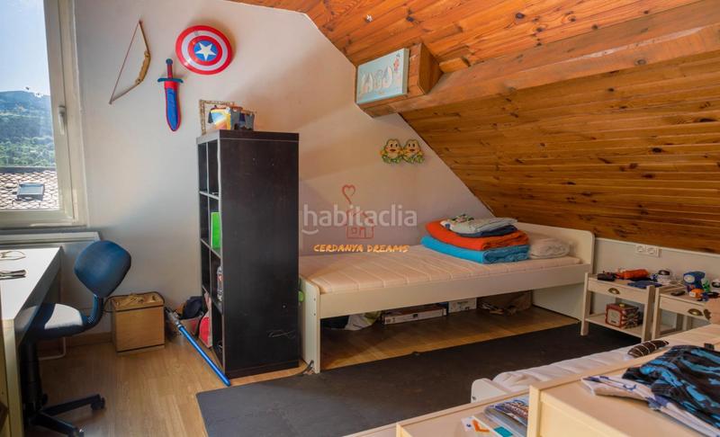 Foto c719c599-6b73-414b-87b8-04e51c8042ec. Casa pareada pareada con jardín en Enveitg