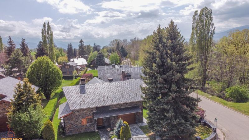 Foto 5a072de0-e56e-4a27-b327-edeec257be43. Chalet  con jardín privado en Llívia