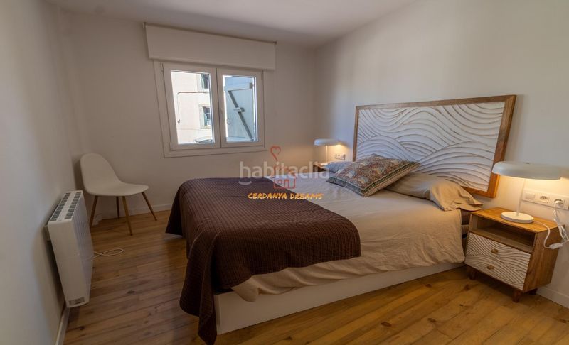 Foto a0db9935-7cb1-4a93-b55c-d21dc1da27c3. Planta baixa amb xemeneia calefacció aparcament a Osseja